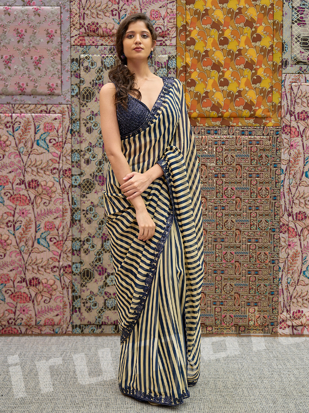 Black & Gold Printed Stripe Saree With Embroidered Sleeveless Choli