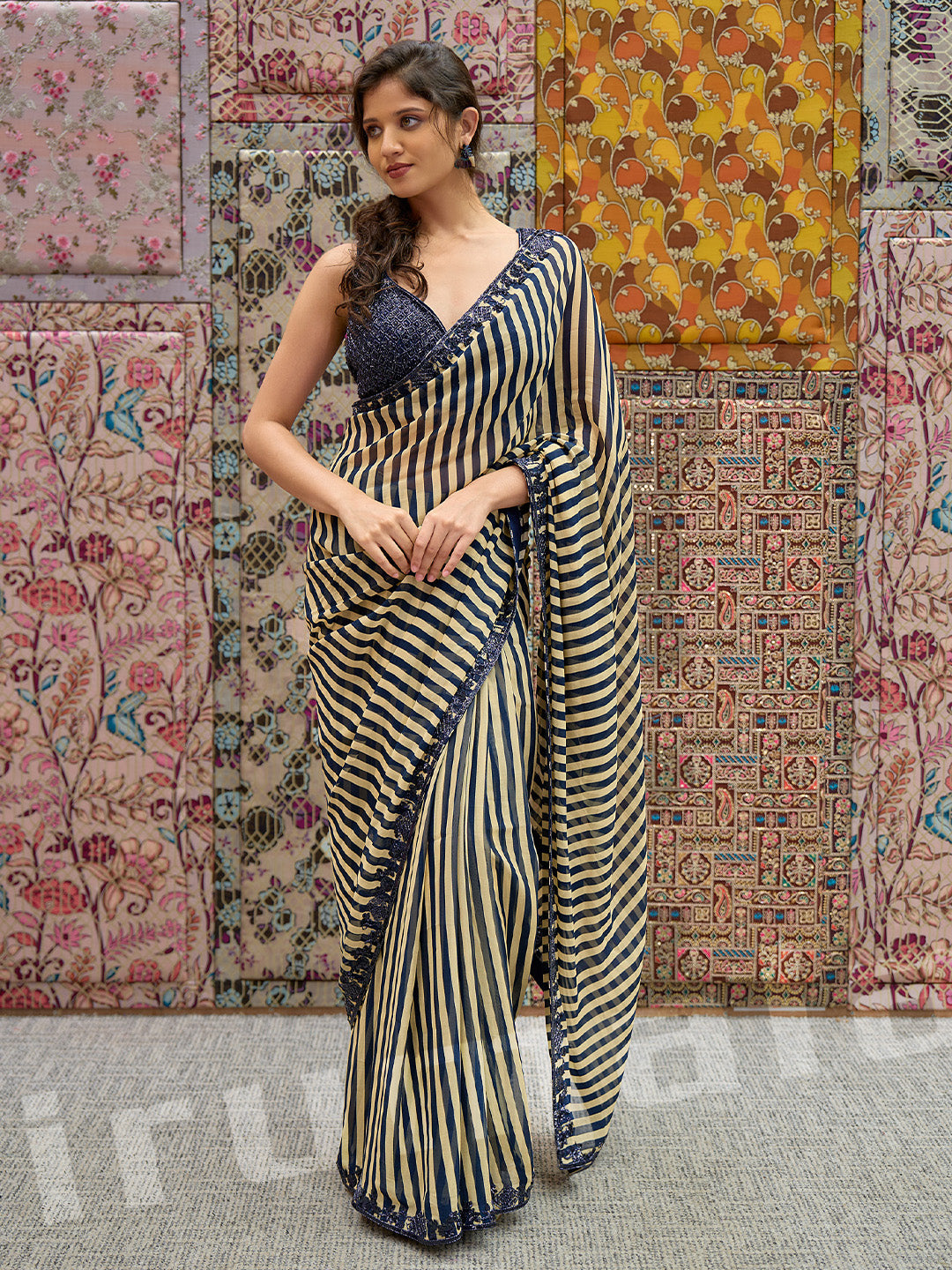 Black & Gold Printed Stripe Saree With Embroidered Sleeveless Choli