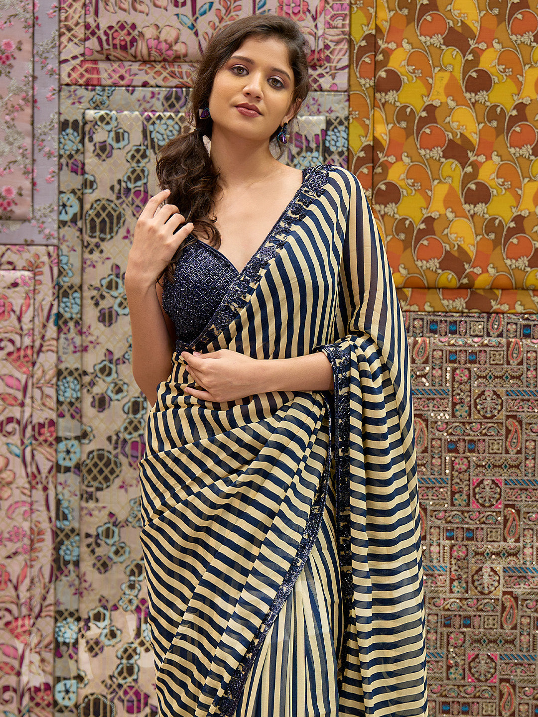 Black & Gold Printed Stripe Saree With Embroidered Sleeveless Choli