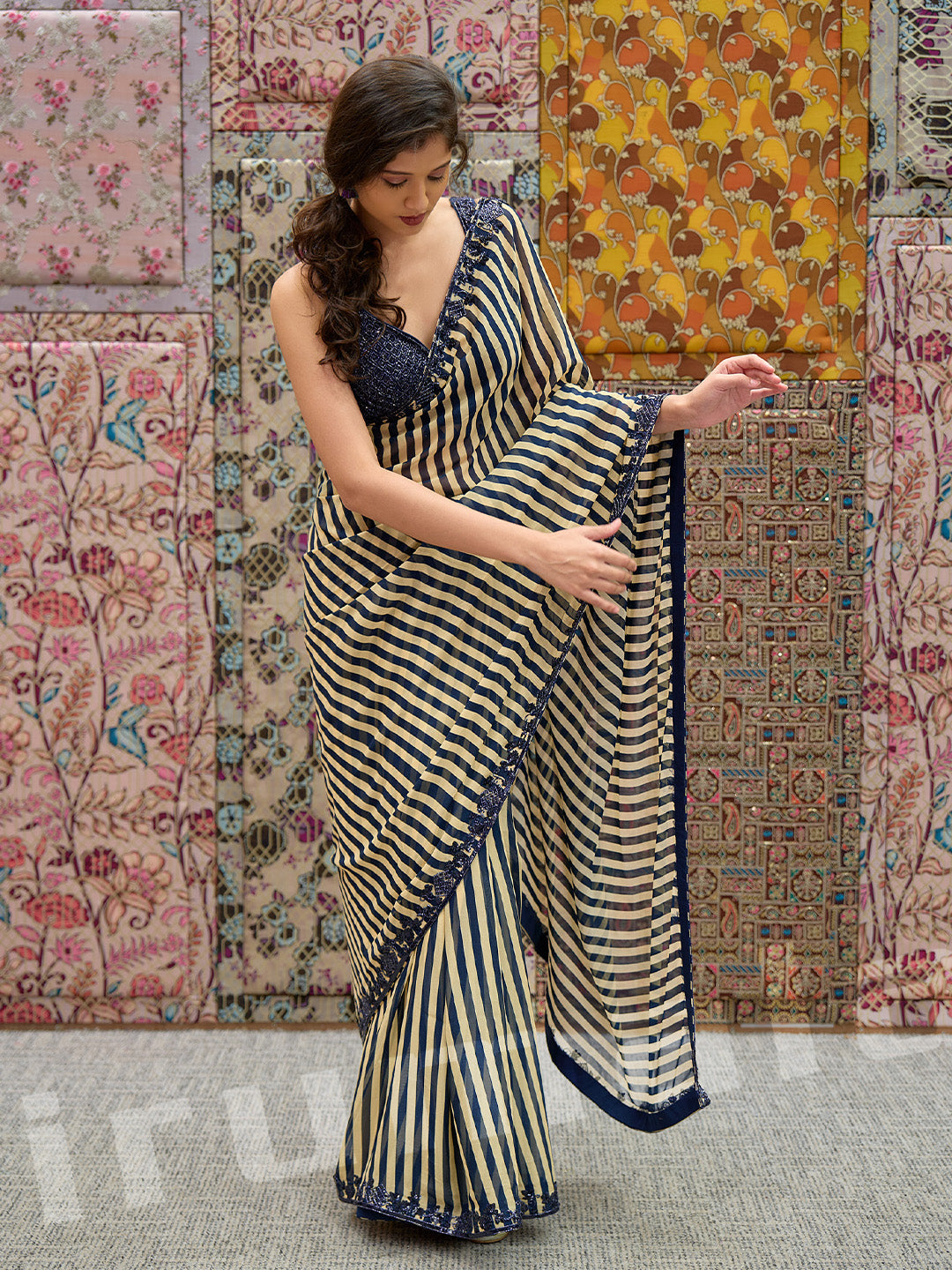 Black & Gold Printed Stripe Saree With Embroidered Sleeveless Choli