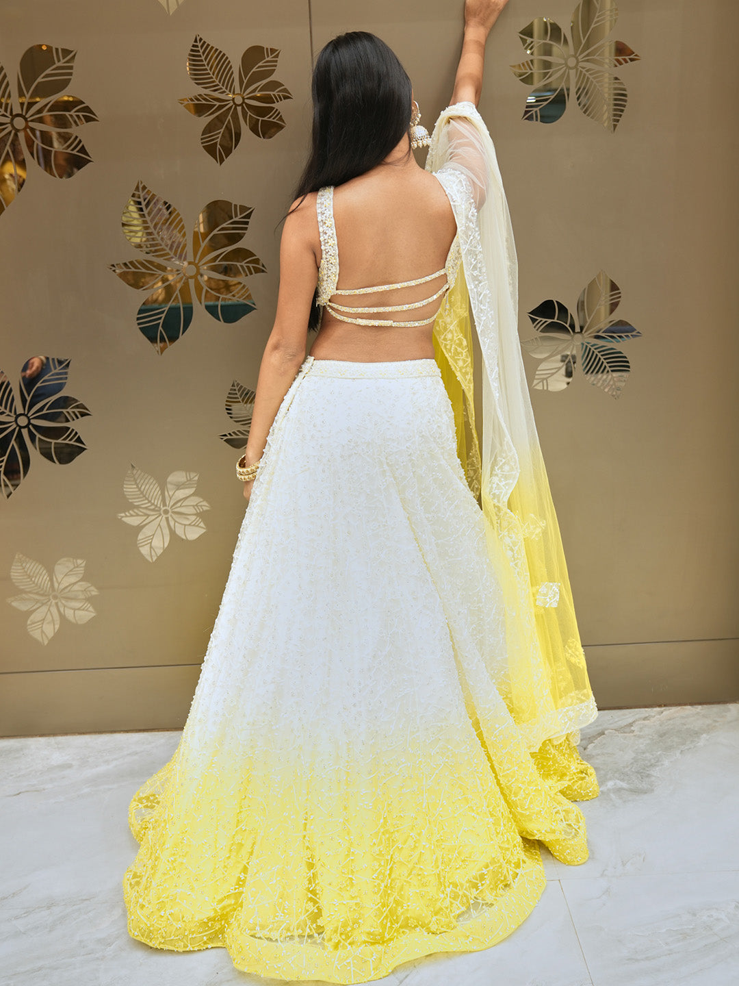 Elegant Cream Lehenga Choli With Contrasting Yellow Trim