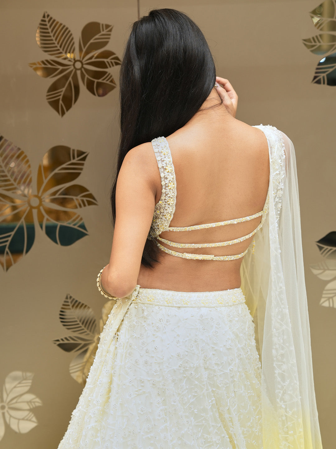 Elegant Cream Lehenga Choli With Contrasting Yellow Trim