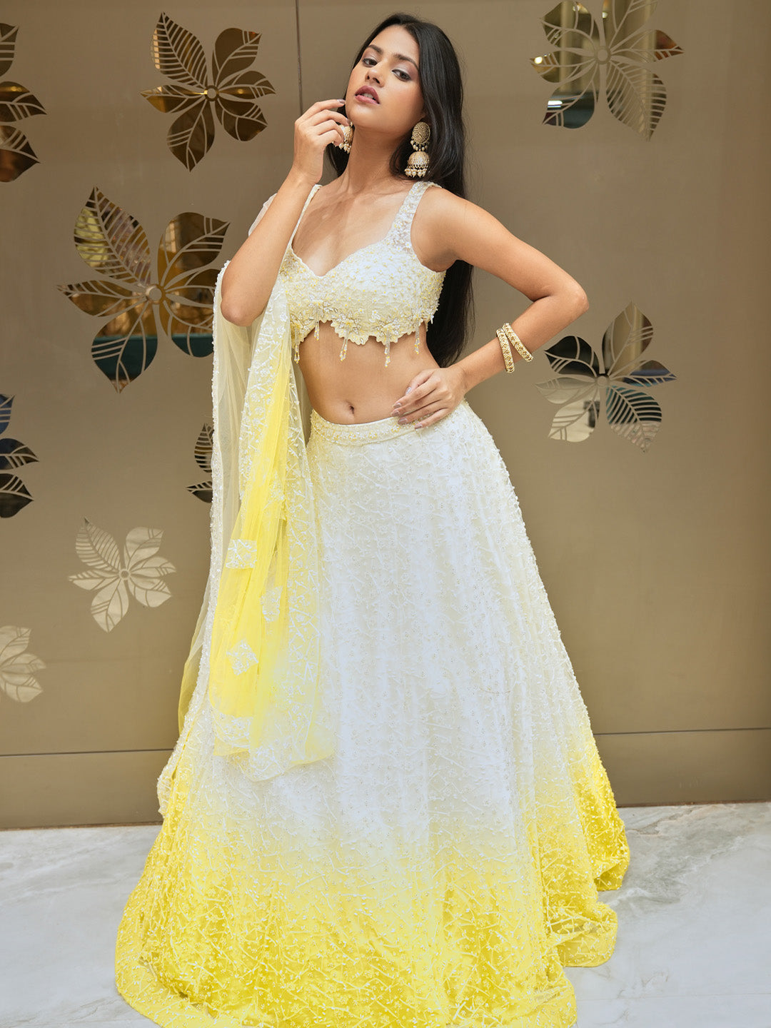 Elegant Cream Lehenga Choli With Contrasting Yellow Trim