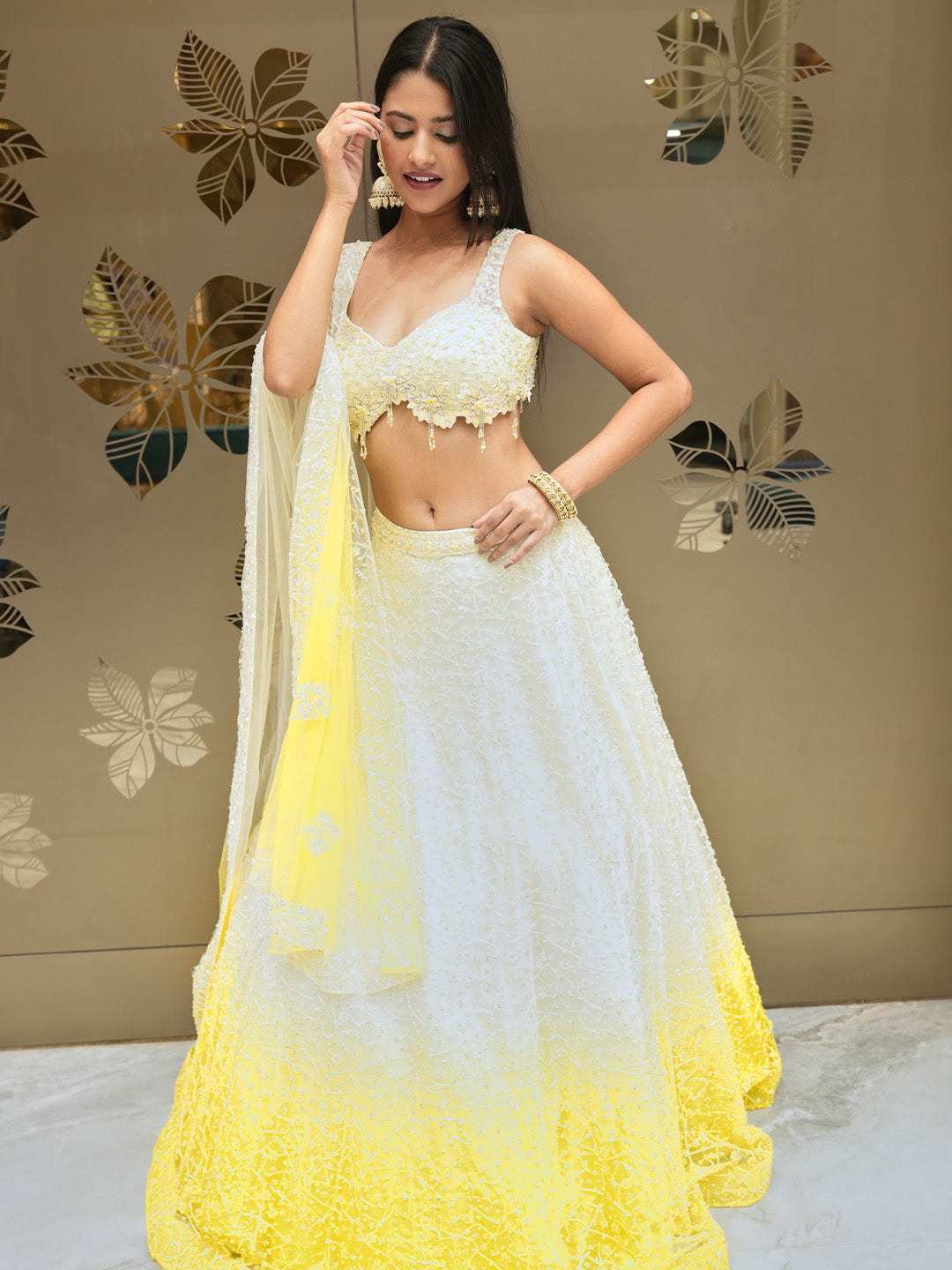 Elegant Cream Lehenga Choli With Contrasting Yellow Trim