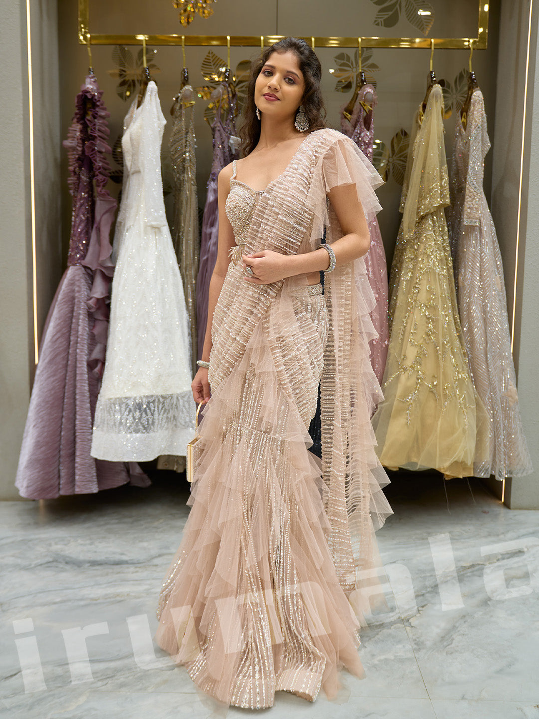 Peach Hand-Embroidered Ruffle Pleated Net Saree With Katdana Hangings