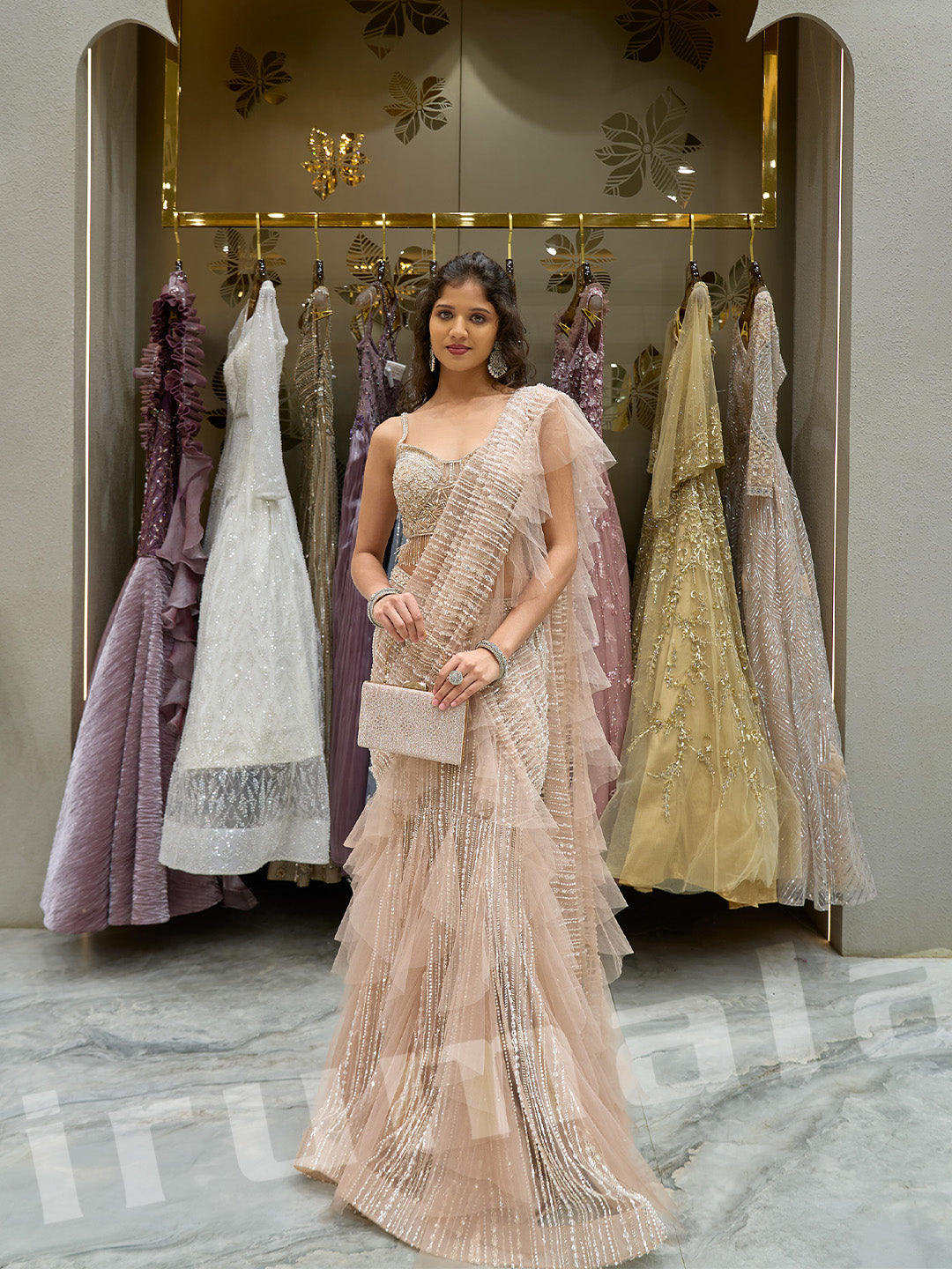 Peach Hand-Embroidered Ruffle Pleated Net Saree With Katdana Hangings